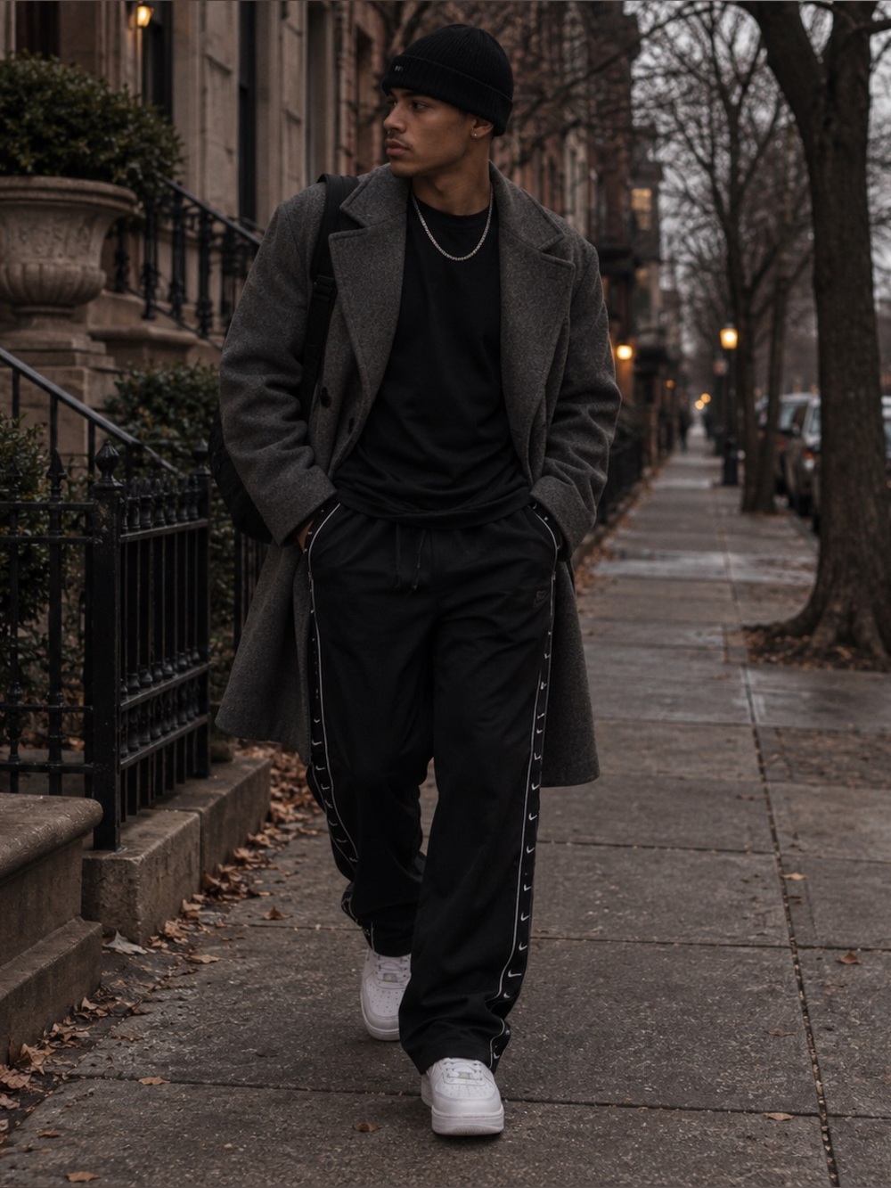 Nike Black Track Pants with White Swoosh Side Tape